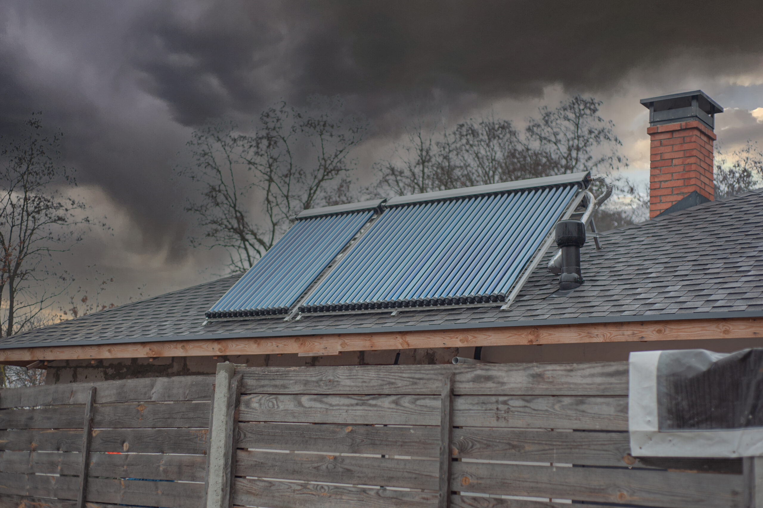 Energy generation SunPower solar panels on the roof of a farmhouse 